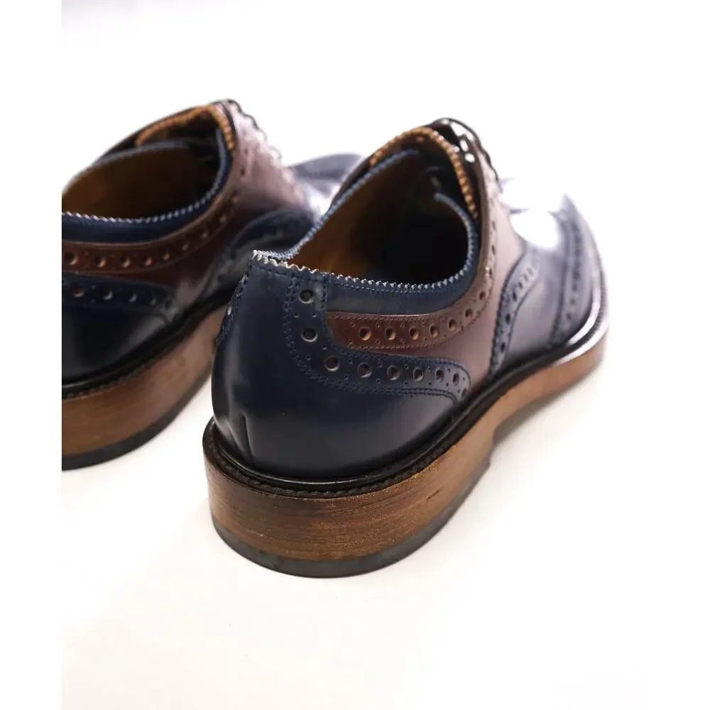$1,250 FERRAGAMO - Navy Blue/Brown Leather Wingtip Oxfords - 9 D